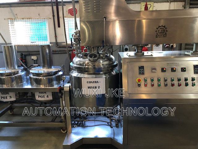 Vacuum homogenizing emulsifying machine